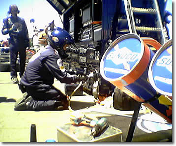 NASCAR pit mechanic practising wheel change